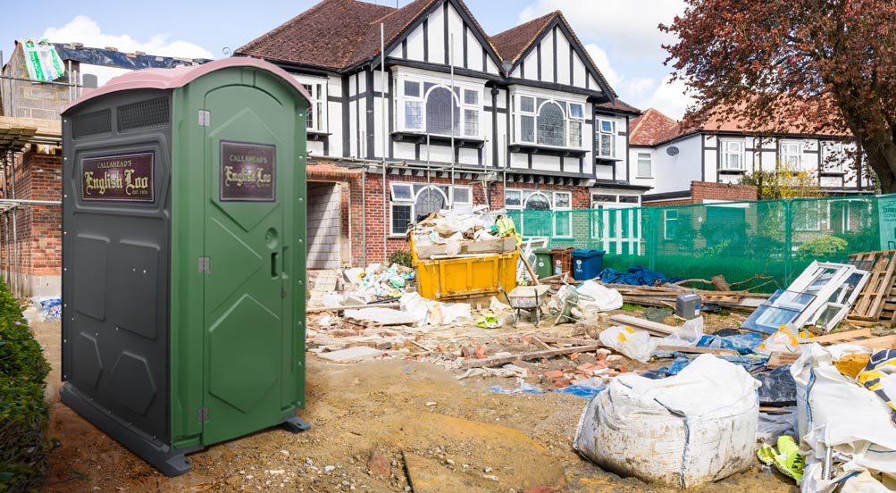 English Loo | English Loo Portable Restroom in front of residential construction.