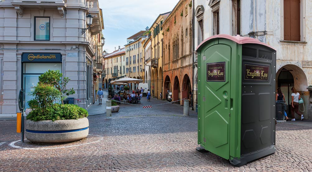 English Loo | English Loo Portable Toilet in a small town with cobblestone streets.