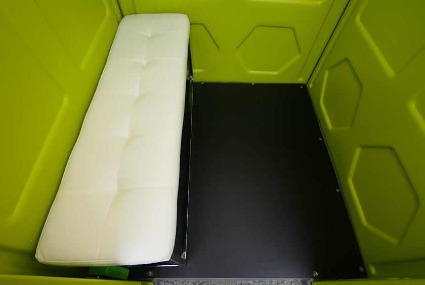 EYE WASH STATION HAS A FAUX LEATHER CUSHION BENCH AND AMPLE FLOOR SPACE