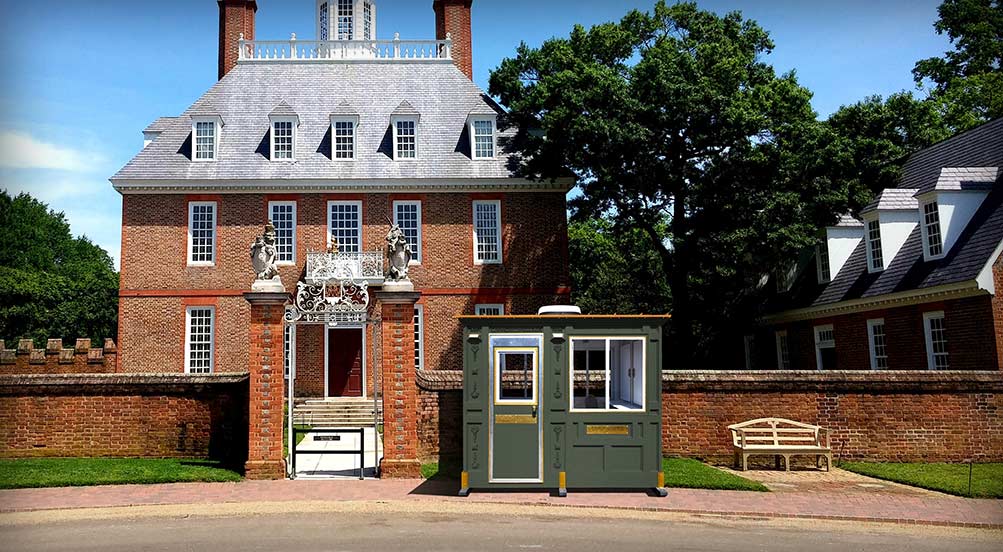 Valet Key Booth 32 | Valet Key Booth 32 in front of a luxury home.