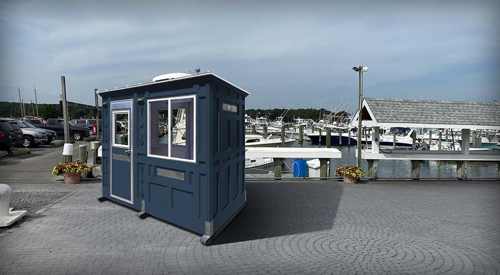 Valet Key Booth 32 | Valet Key Booth 32 in front of a marina in the summer.