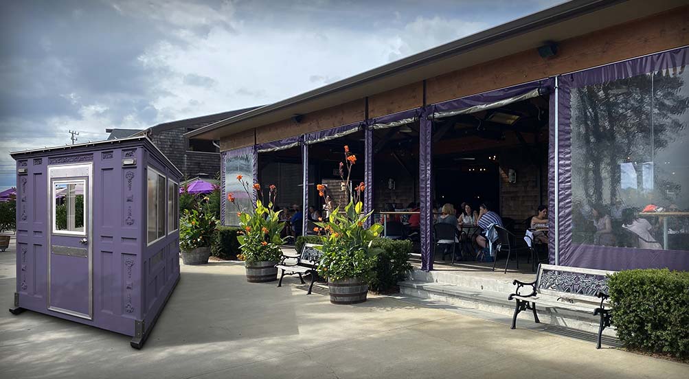 A Lavender Valet Key Booth 48 Outside of an Outdoor Restaurant