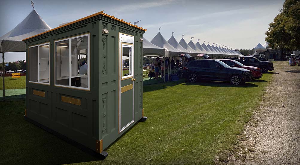 A Green Valet Key Booth 48 at an Outdoor Festival Parking Lot