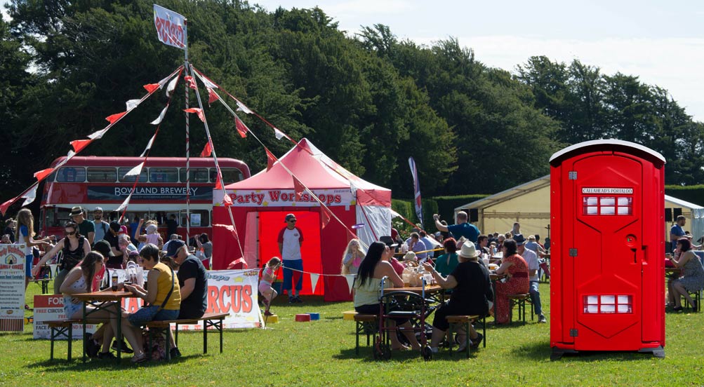 Portaloo Portable Restroom | Portaloo Portable Toilet shown at a fairgrounds with a traveling circus.